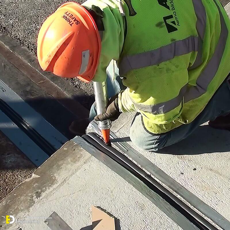 Bridge-Expansion-Joint-BEJS-injecting-silicone-sealant-band-EMSEAL.jpg