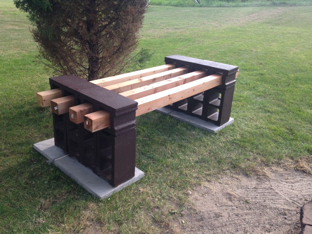 Combine the strength of concrete with the warmth of wood to make a stylish bench for the garden.