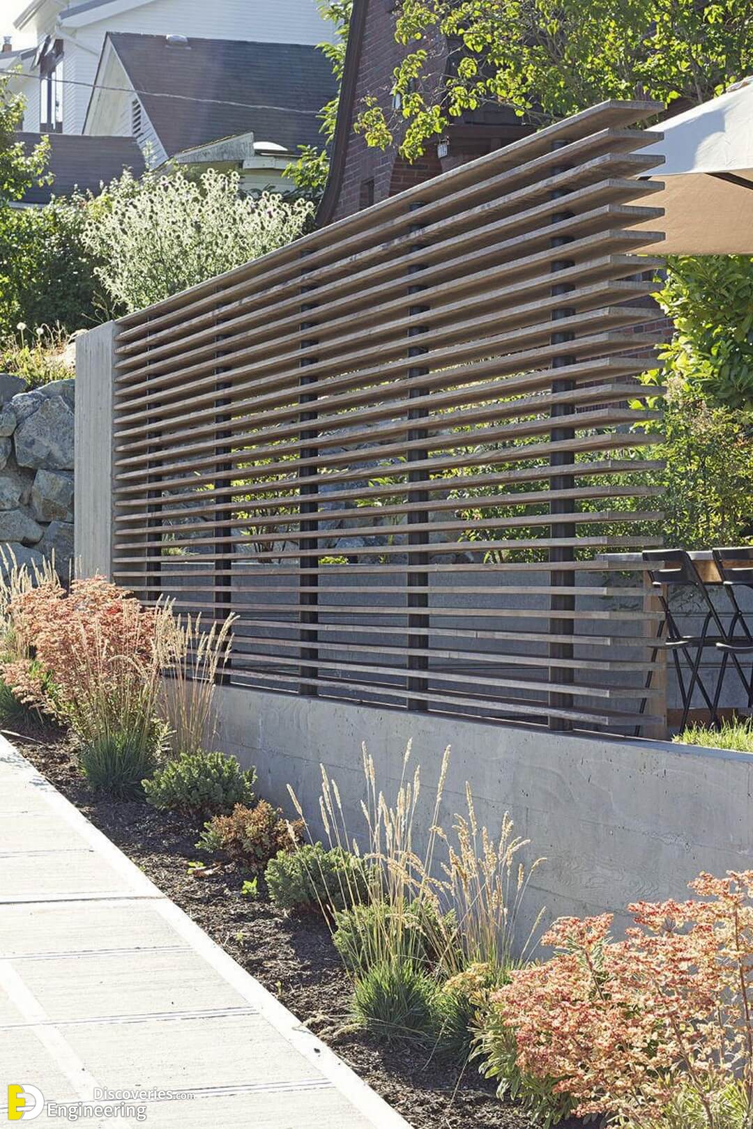 Raised-Garden-Beds-for-Those-of-Us-with-Sloped-Yard-Fence-6.jpg