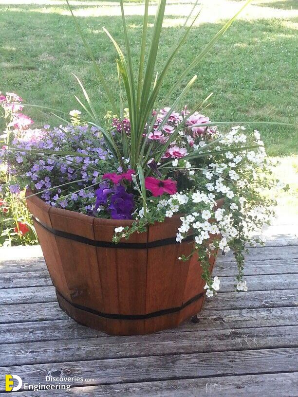 64a4fdc887570253ddc167e547e8d34c-whiskey-barrels-wine-barrel-garden-planters.jpg