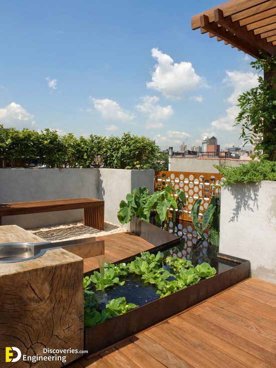 Roof-terrace-design-ideas-wood-flooring-bench-Feng-Shui-pond.jpg