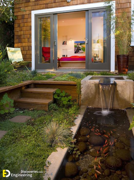 contemporary-patio-concrete-basin-koi-pond-garden-waterfall.jpg