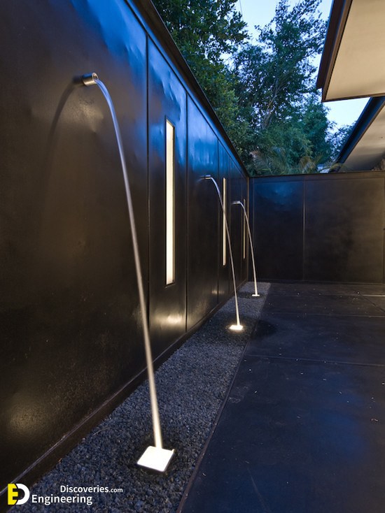 contemporary-patio-minimalist-design-high-fence-garden-eater-features-modern-fountains.jpg