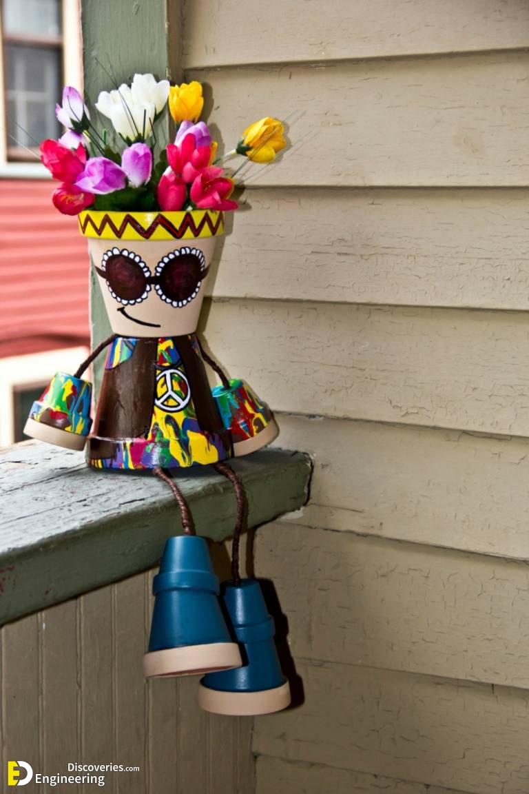 gartendeko-aus-tontoepfen-hippie-figur-tulpen-vase-kopf-malen-768x1152-1.jpg