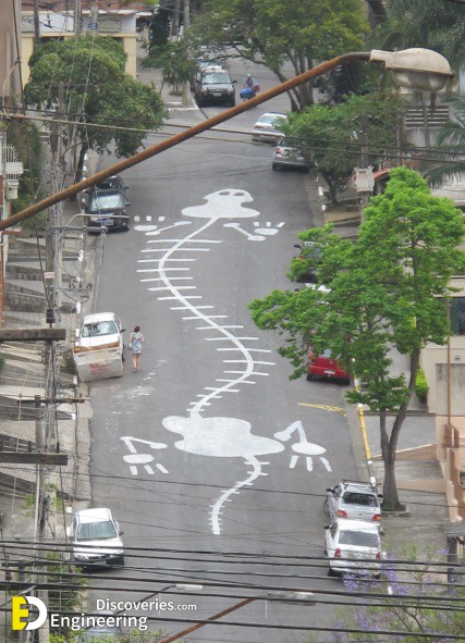 street-art-geant-sur-le-bitume-sao-paulo-par-tec-5.jpg