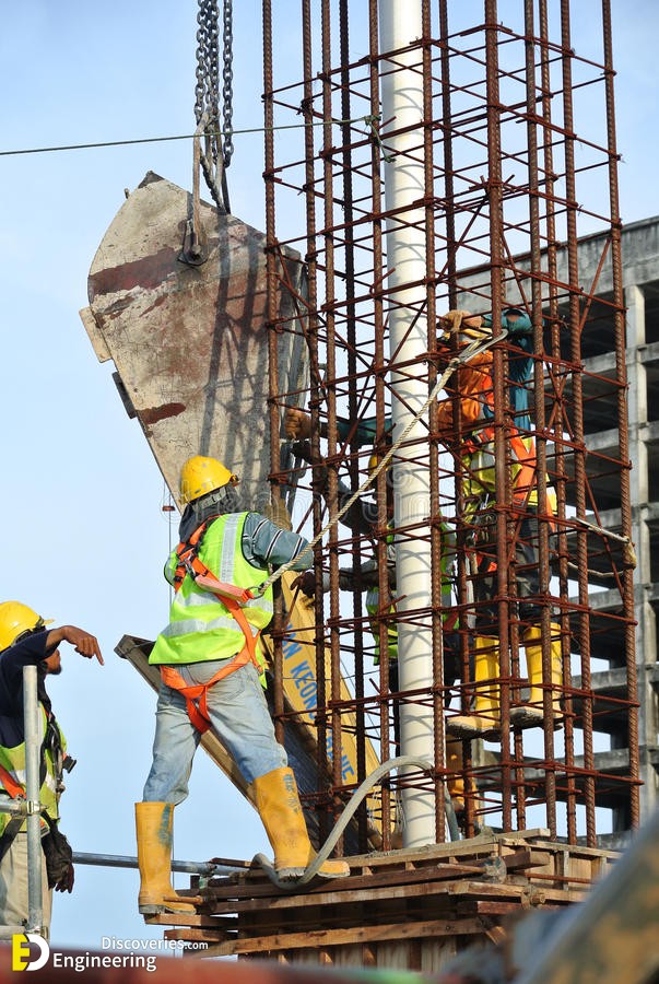 group-construction-workers-pouring-concrete-column-form-work-selangor-malaysia-C3A2E282AC-december-using-bucket-67900386.jpg