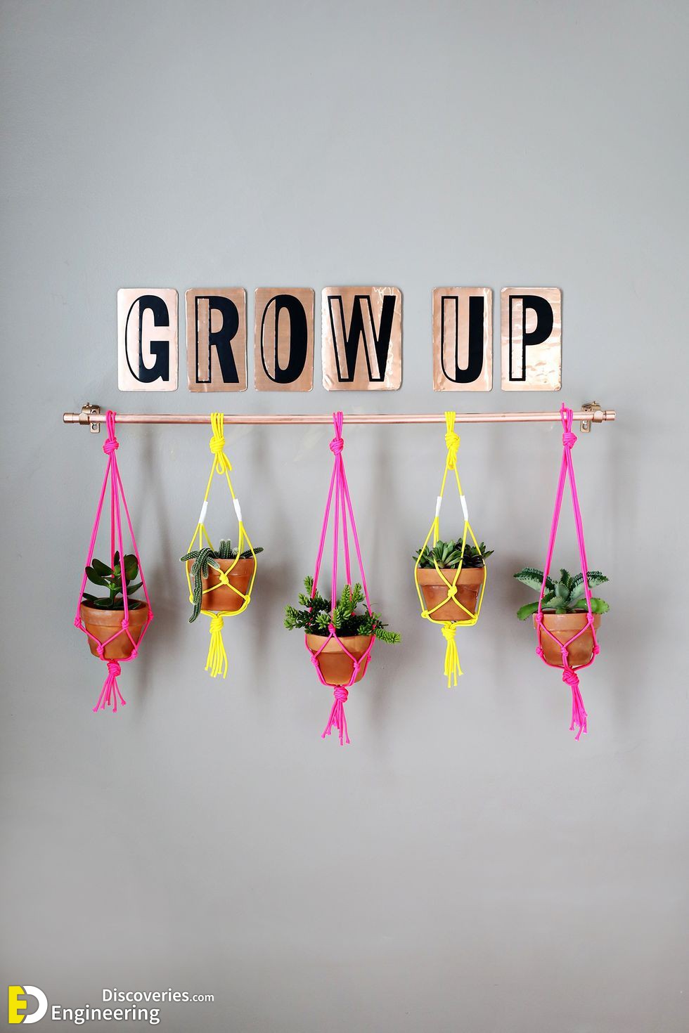 vertical-garden-ideas-copper-pipe-hanging-planter-1658976163.jpeg