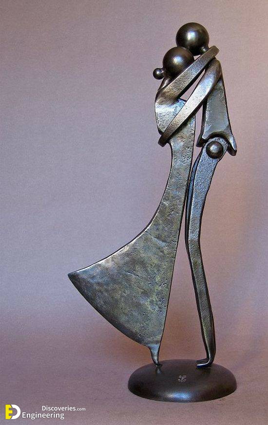 1-Wonderful-Couple-Sculpture-Made-From-Waste-Metal-Tools.jpg