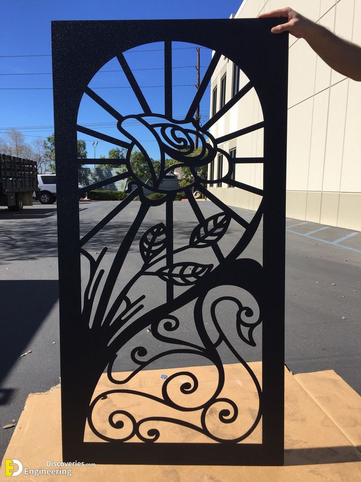1-engineering-discoveries-the-artistry-of-cnc-laser-cutting-in-crafting-metal-doors.jpg