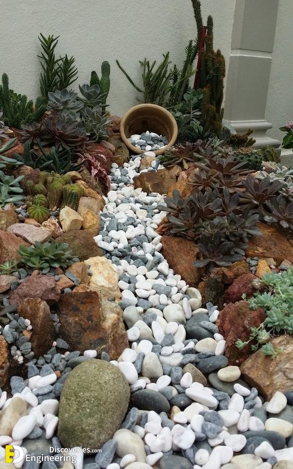 12-engineering-discoveries-nature-inspired-oasis-31-river-rock-landscaping-ideas-to-elevate-your-garden.jpg