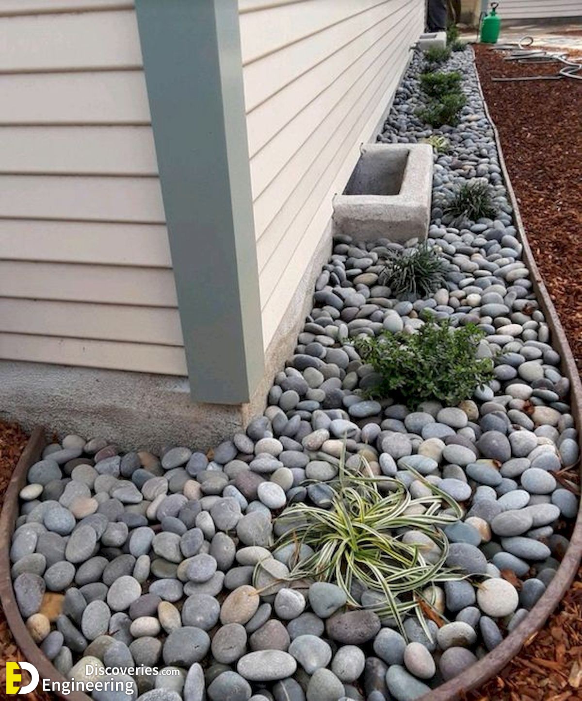 14-engineering-discoveries-nature-inspired-oasis-31-river-rock-landscaping-ideas-to-elevate-your-garden.jpg