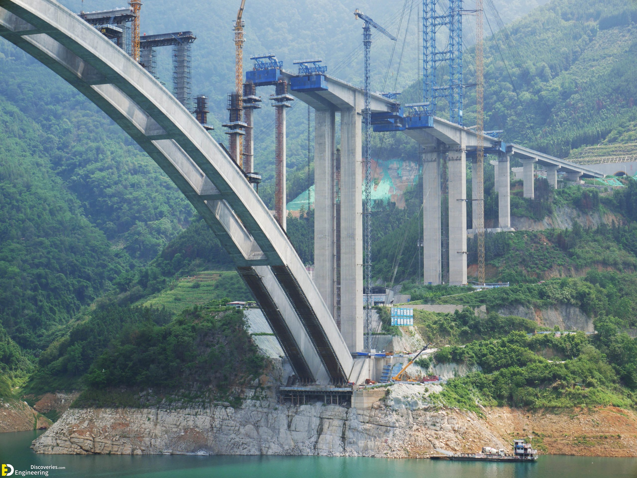 23-engineering-discoveries-building-bridges-302B-photos-of-structure-bridge-under-construction-scaled.jpg