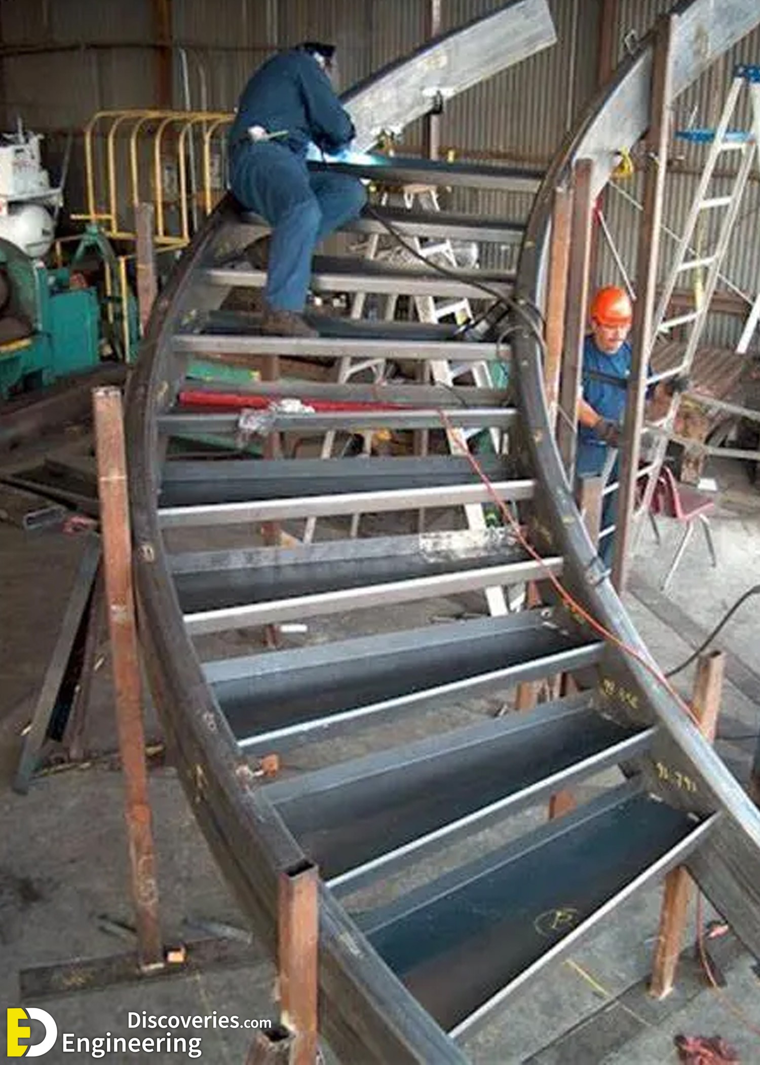 1-engineering-discoveries-272B-photos-of-iron-spiral-stairs-under-construction.jpg