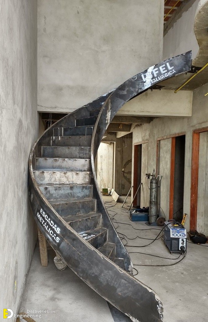 4-engineering-discoveries-272B-photos-of-iron-spiral-stairs-under-construction.jpg