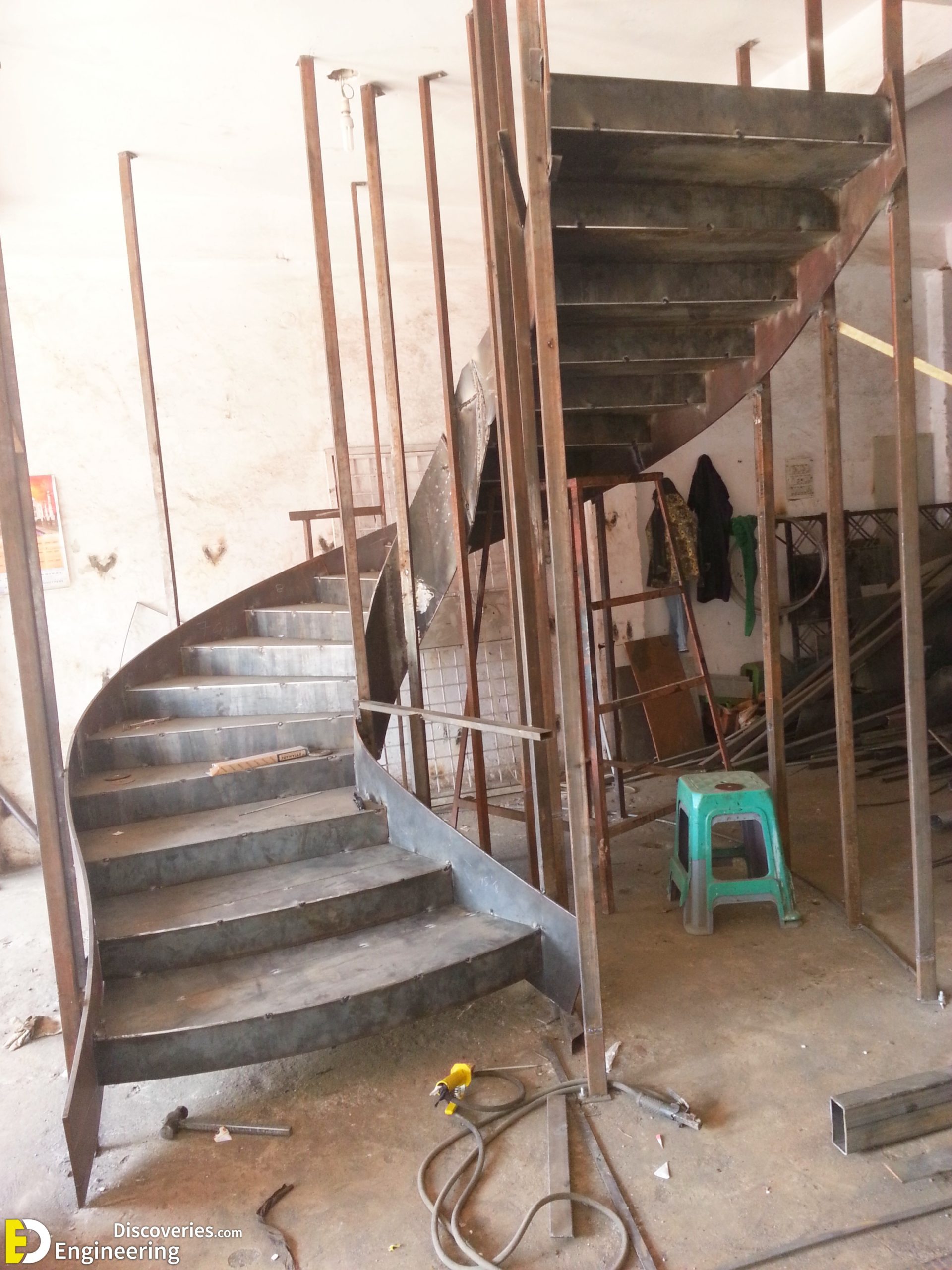 7-engineering-discoveries-272B-photos-of-iron-spiral-stairs-under-construction-scaled.jpg