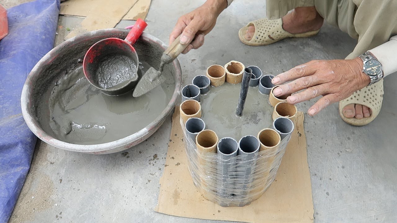 27-engineering-discoveries-how-to-make-beautiful-decorative-plant-pots-from-plastic-bottles-and-cement-.jpg