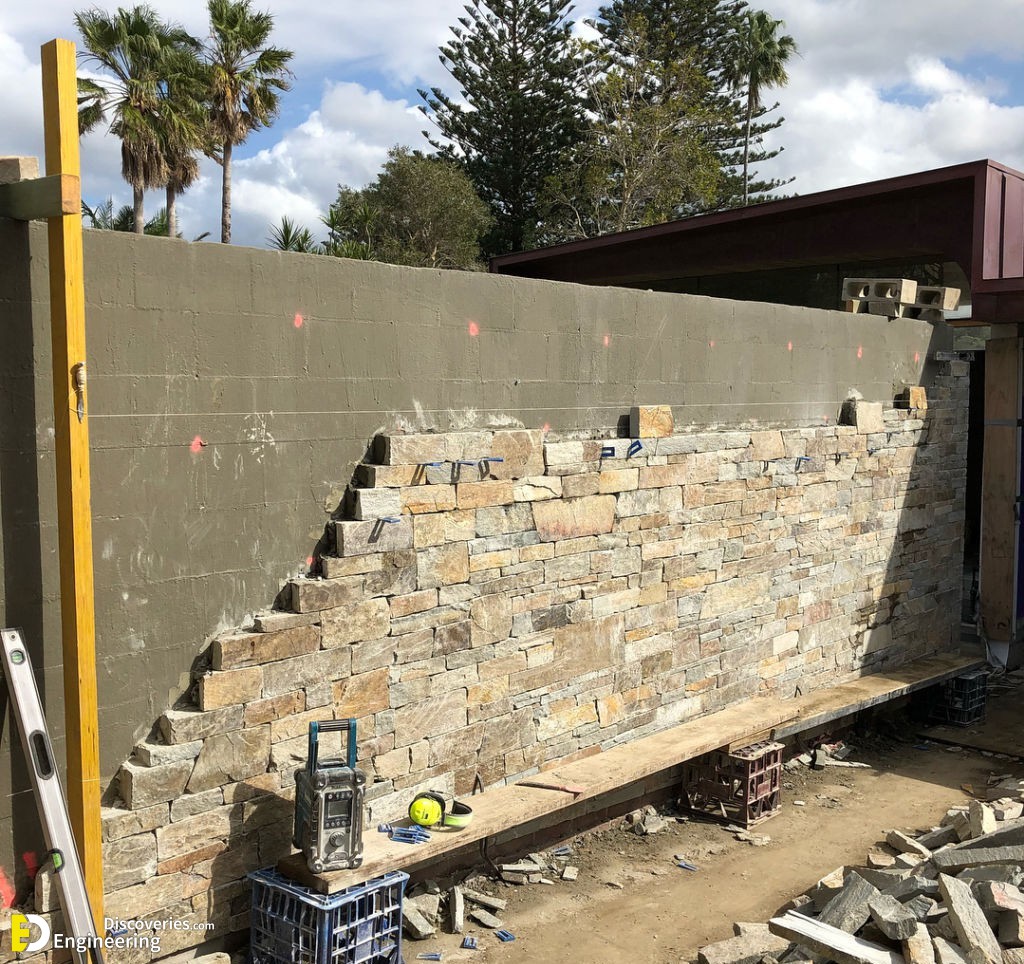 34-engineering-discoveries-how-to-build-a-stone-wall-stone-wall-projects-under-construction.jpg