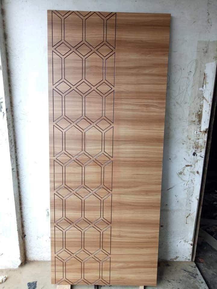 10-engineering-discoveries-modern-wooden-door-designs-for-your-dream-home.jpg